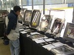Man looks at Alberta sports memorabilia